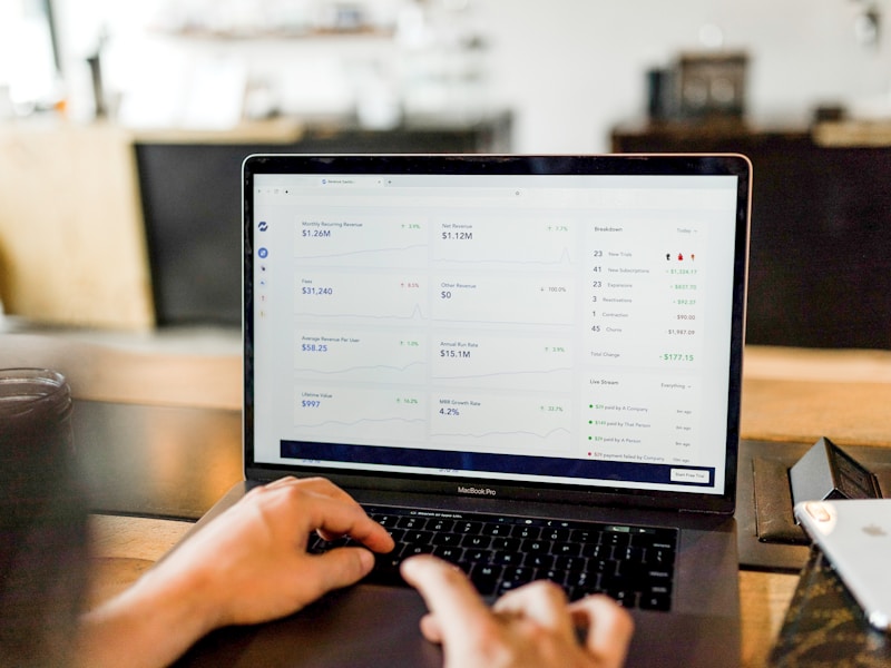 Contractor building a resource hub on a laptop
